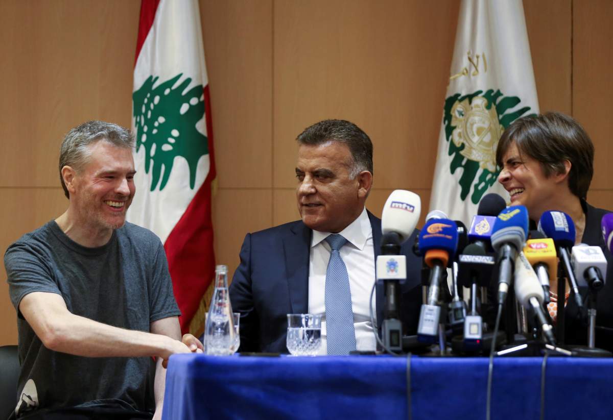 Canadian citizen, Kristian Lee Baxter, who was being held in Syria, shakes hands with Major General Abbas Ibrahim, Lebanon’s internal security chief, next to Canadian Ambassador to Lebanon, Emmanuelle Lamoureux, after being released, at a news conference in Beirut, Lebanon August 9, 2019.