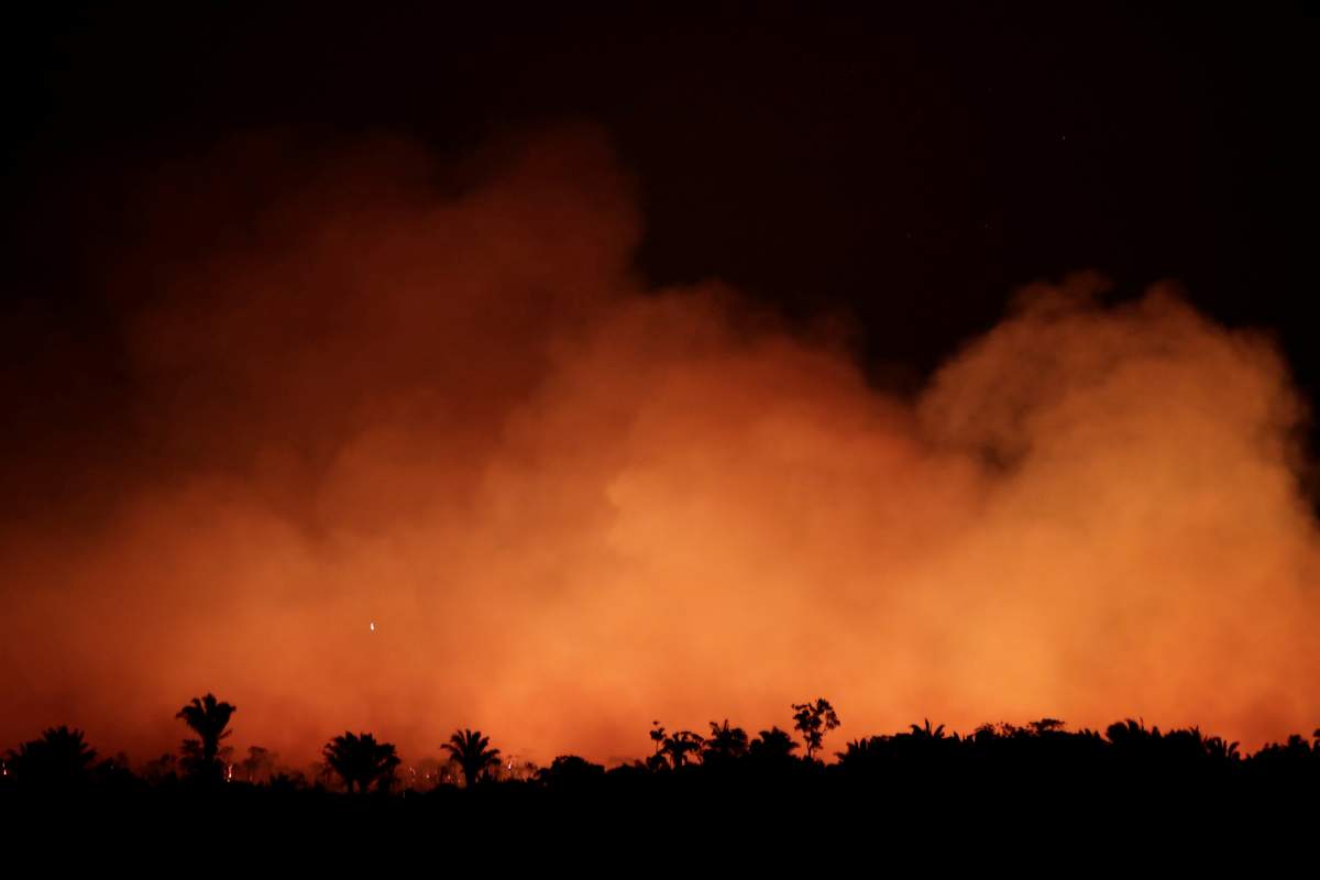 Smoke billows during a fire in an area of the Amazon rainforest near Humaita, Amazonas State on Aug. 17.