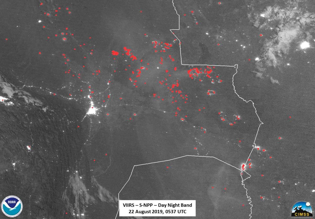 Active fires, represented by red dots, are pictured from space over Bolivia, captured by the Suomi NPP weather satellite on Aug. 22, 2019.