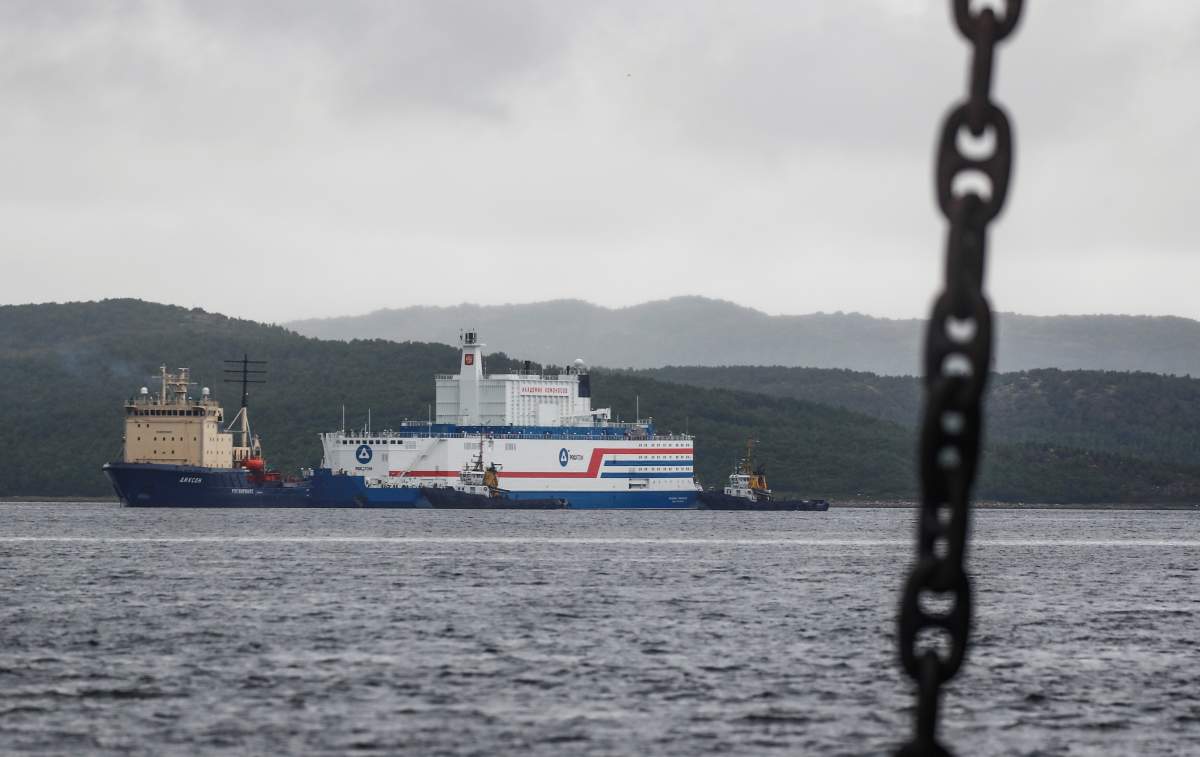A view shows Russia’s floating nuclear power plant Akademik Lomonosov and tugboat Dixon before the departure from the service base of Rosatomflot company for a journey along the Northern Sea Route to Chukotka in Murmansk, Russia August 23, 2019. REUTERS/Maxim Shemetov