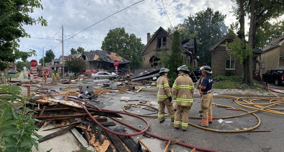 Fire crews at the scene of the explosion in London’s Old East Village which destroyed a home on Woodman Avenue and damaged several other homes.