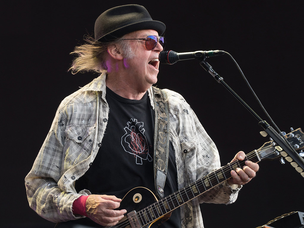 Neil Young performing live on stage in Hyde Park in London on Friday, July 12, 2019.
