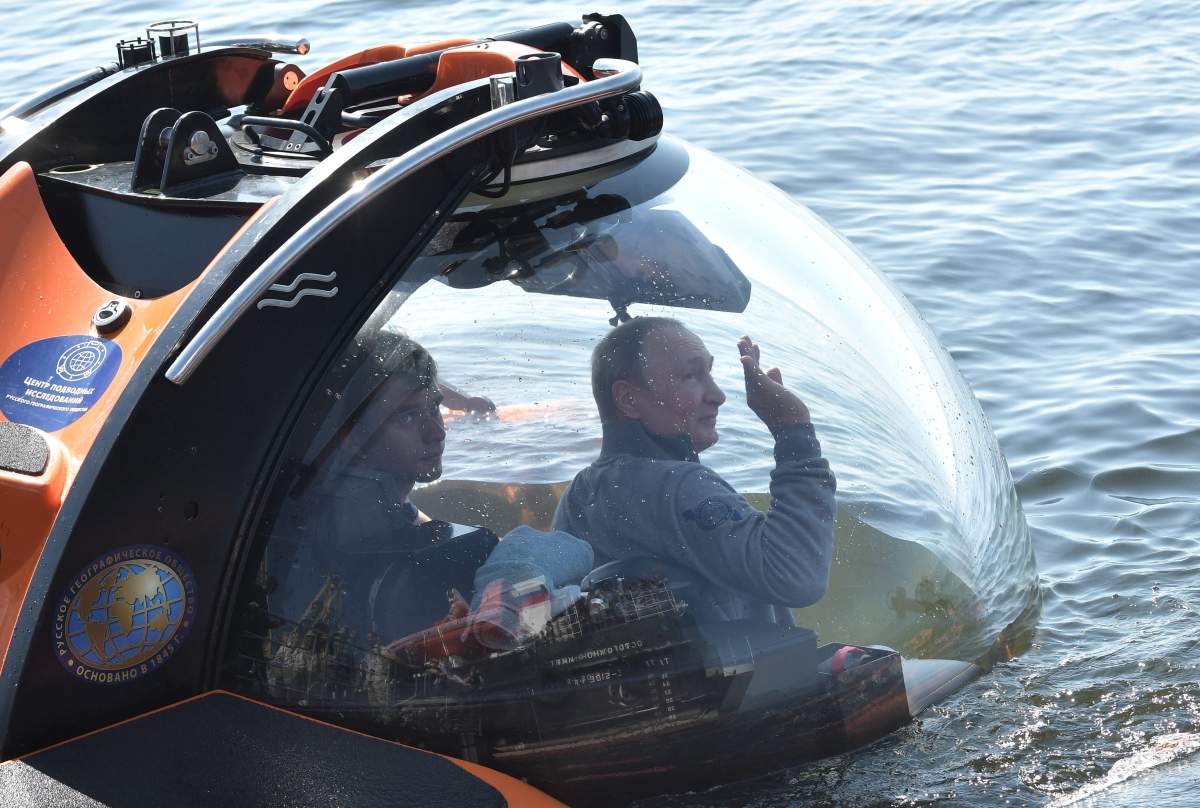 Russian President Vladimir Putin submerges on board the C-Explorer 3.11 bathyscaphe near the isle of Gogland in the Gulf of Finland visiting Shch-308 Semga submarine which sank in 1942, in Leningrad region, Russia, 27 July 2019. 