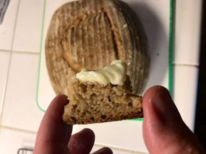 Seamus Blackley shows a piece of buttered sourdough made from ancient Egyptian yeast.