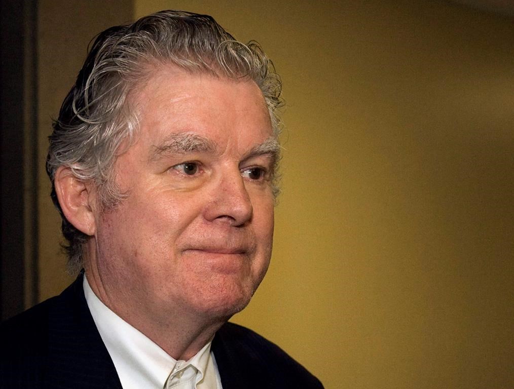 Ernest Fenwick MacIntosh heads from Nova Scotia Court of Appeal in Halifax on Thursday, Oct. 7, 2010. A Nova Scotia man who served time in a Nepalese prison for sexually abusing a youth has been charged in a Quebec court with failing to report his location to Canadian authorities after he returned to the country. THE CANADIAN PRESS/Andrew Vaughan.