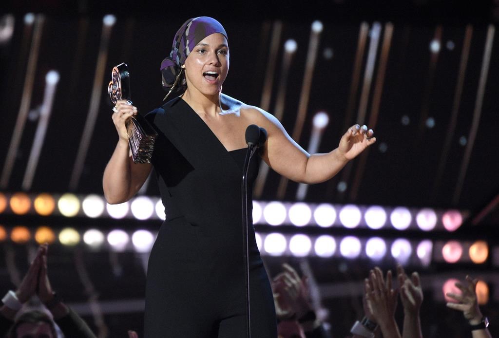 In this March 14, 2019 file photo, Alicia Keys accepts the music innovator award at the iHeartRadio Music Awards at the Microsoft Theater in Los Angeles, Calif.