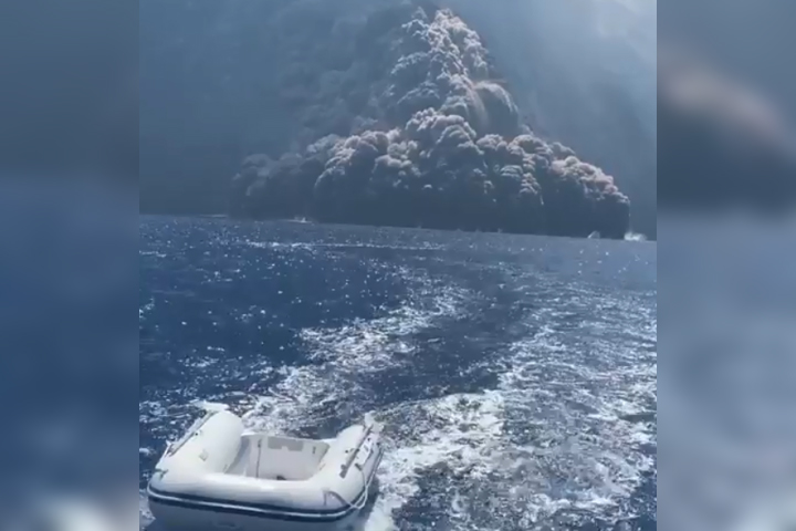 Elena Schiera and her family escape from an erupting volcano on Stromboli Island in Italy in this image from video recorded Aug. 28, 2019.