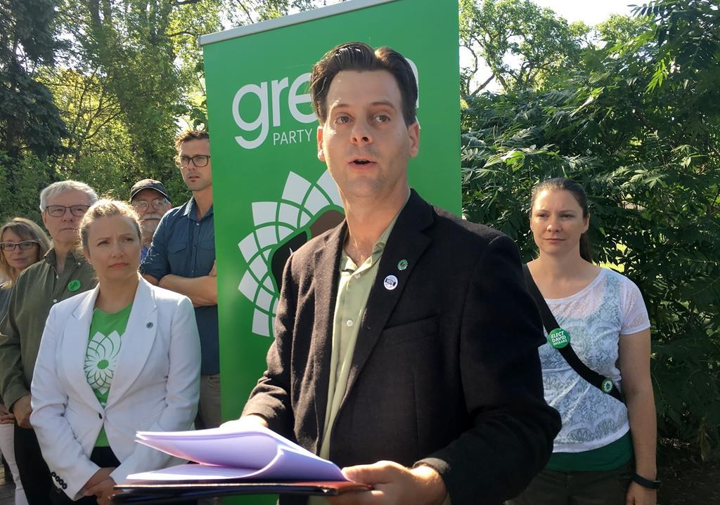 Former Manitoba Green Party Leader James Beddome talks to reporters.