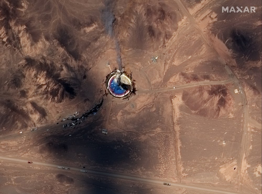 This satellite image from Maxar Technologies shows a fire at a rocket launch pad at the Imam Khomeini Space Center in Iran's Semnan province, Thursday, Aug. 29, 2019. Satellite images released Thursday show the smoldering remains of a rocket at a Iran space center that was to conduct a U.S.-criticized satellite launch. 