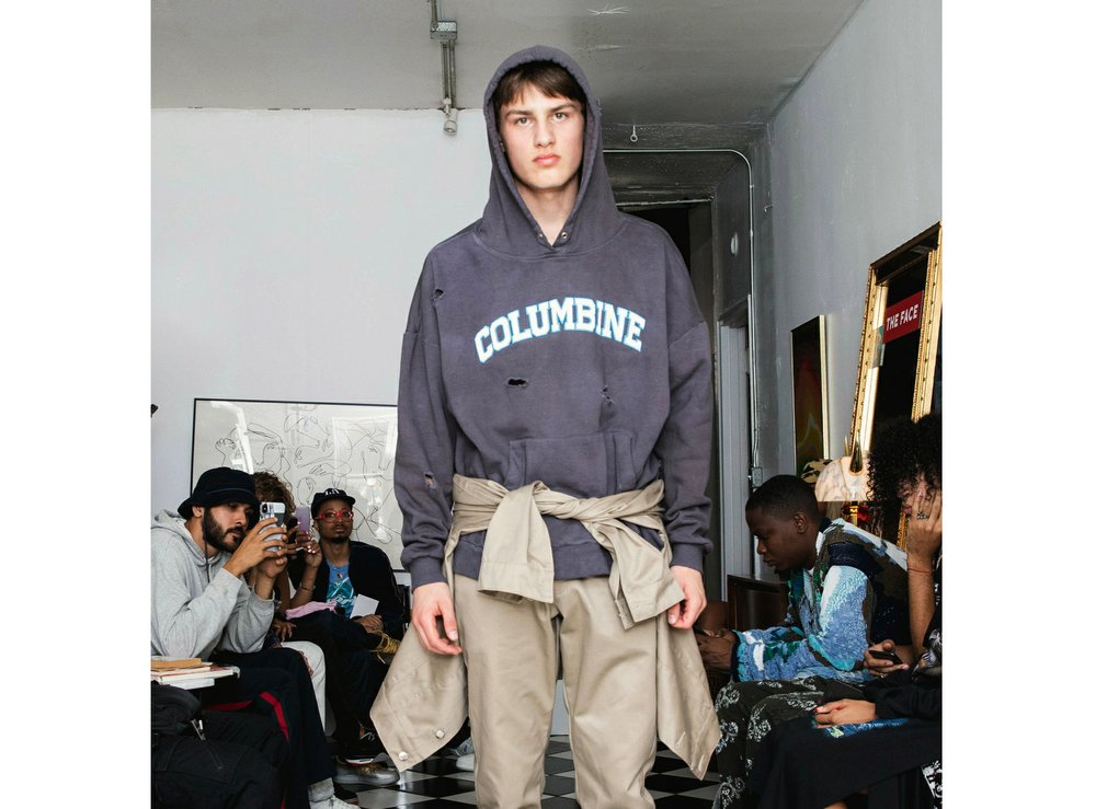 Models at a show for fashion brand Bstroy wear hoodies emblazoned with the names of schools touched by mass shootings at an apartment in the Soho neighborhood of Manhattan in New York. (Bstroy via AP)