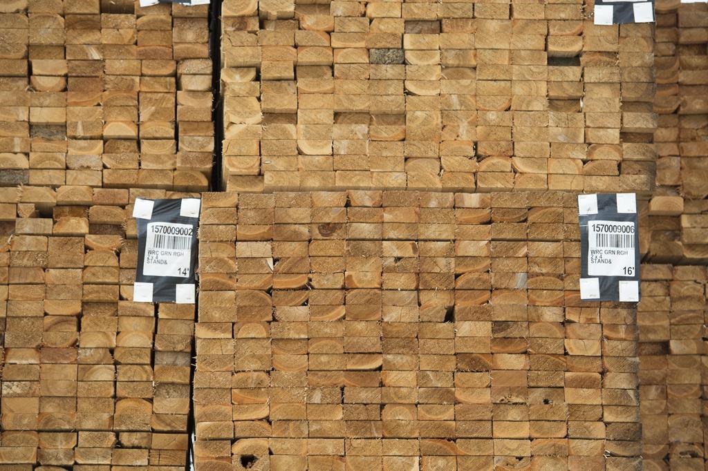 Fresh cut lumber is pictured stacked at a mill along the Stave River in Maple Ridge, B.C. Thursday, April 25, 2019. THE CANADIAN PRESS/Jonathan Hayward.