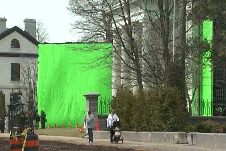 Giant green screens are installed in downtown Kingston during the production of the ‘Crimson Peak’ movie.
