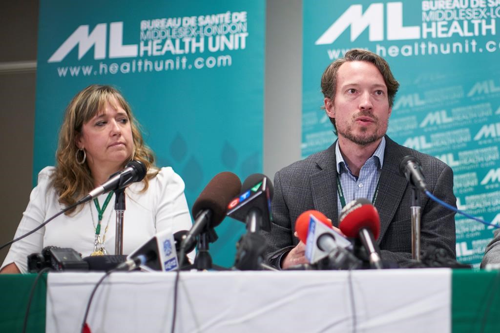 Dr. Chris Mackie, Medical Officer and CEO of Health for the Middlesex-London Health Unit speaks during a press conference in London, Ont., Wednesday, September 18, 2019 as Linda Stobo, manager, Chronic Disease and Tobacco Control at the unit looks on.