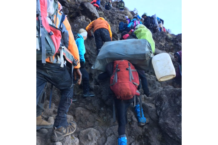Climbing Mount Kilimanjaro.