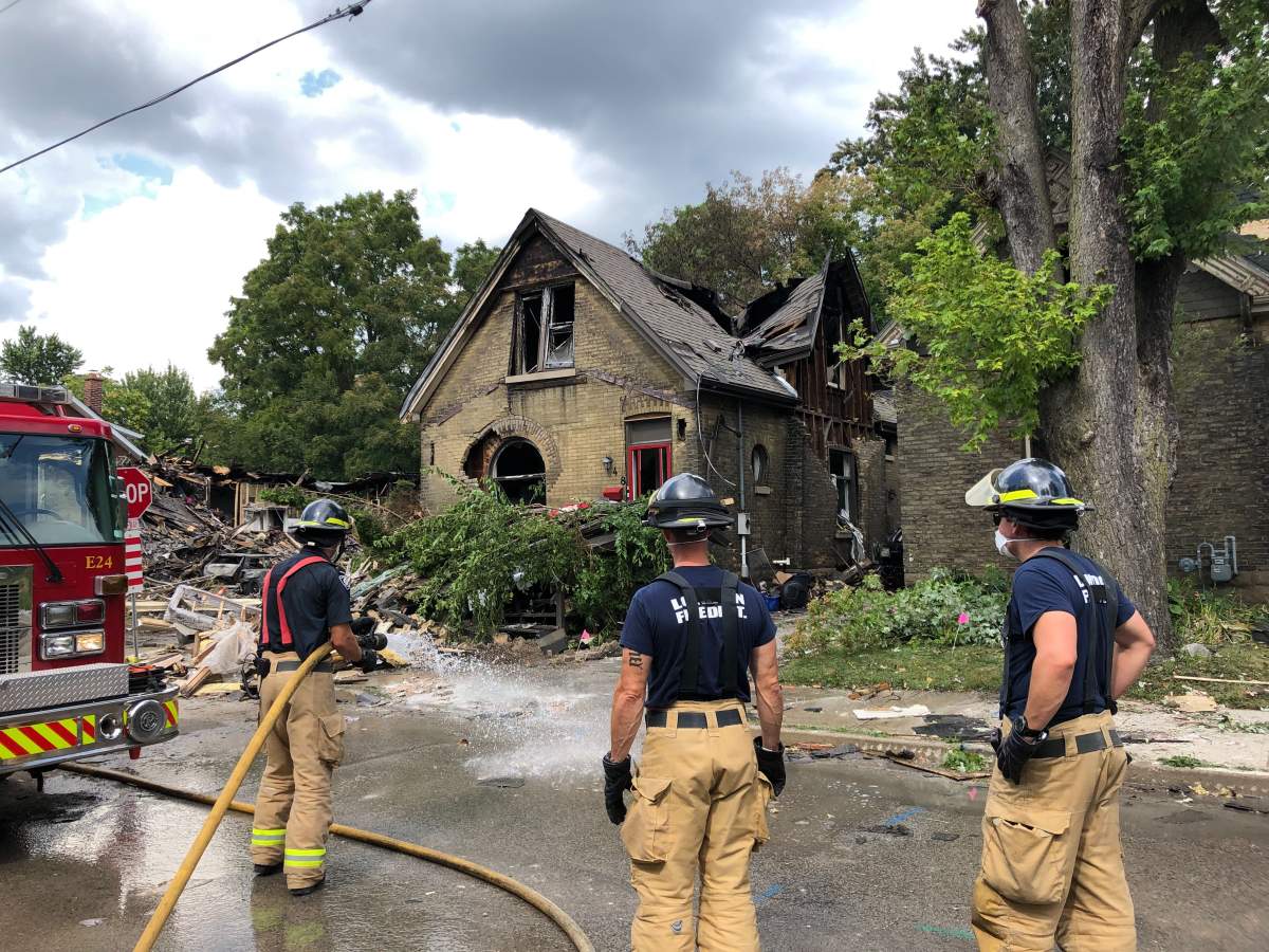 London firefighters deal with the aftermath of a gas explosion in Old East Village.