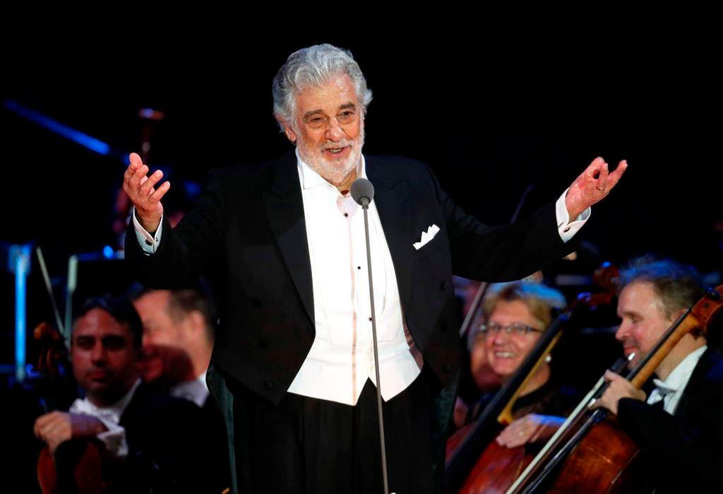 In this Aug. 28, 2019 file photo, opera star Placido Domingo salutes spectators at the end of a concert in Szeged, Hungary. The Metropolitan Opera confirms, Tuesday, Sept. 24, that Domingo has agreed to withdraw from all future performances at the Met, effective immediately.