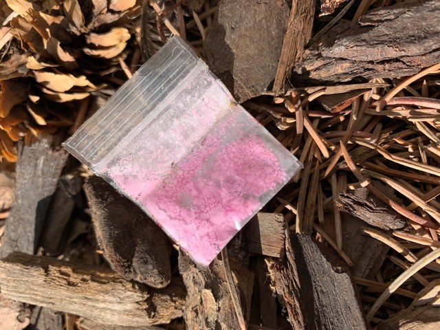 A bag of unknown pink powder Strandquist found in Olympic Plaza.