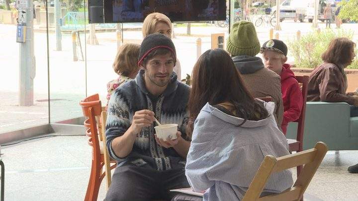 Two strangers who just met are having conversation about social topics over soup as part of a Culture Days event.