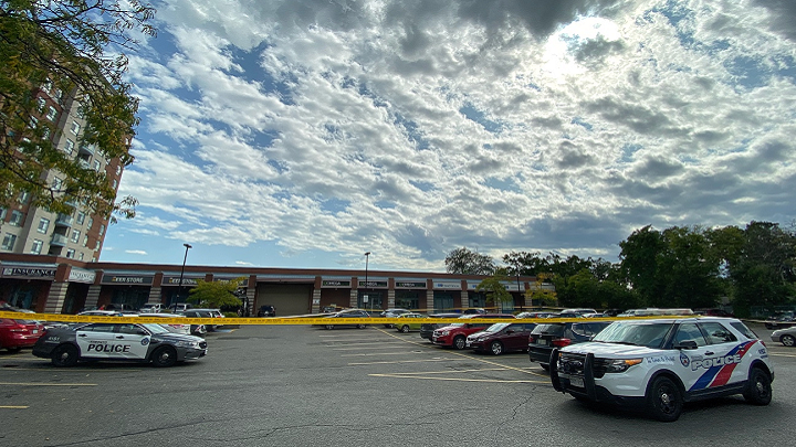 A plaza parking lot near the school was cordoned off by police.