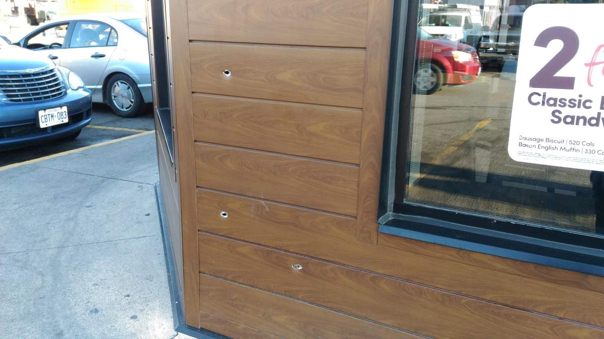 Police say the side of a coffee shop in Central Hamilton was hit by bullets on Sept. 23.