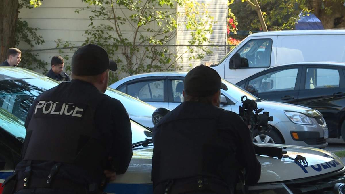Kingston police make an arrest after two hour standoff outside downtown apartment - image