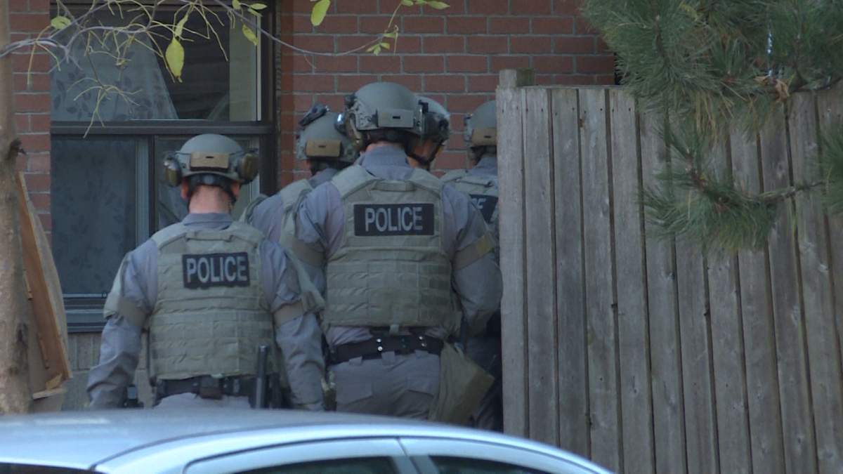 Kingston police make an arrest after two hour standoff outside downtown apartment - image