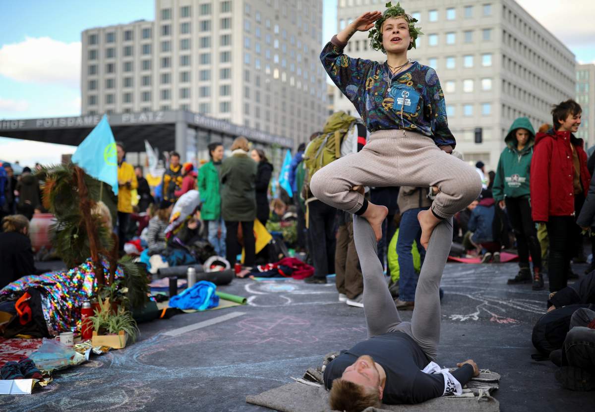 Climate activists attend an Extinction Rebellion protest at Potsdamer Platz square in Berlin, Germany, October 7, 2019. REUTERS/Hannibal Hanschke