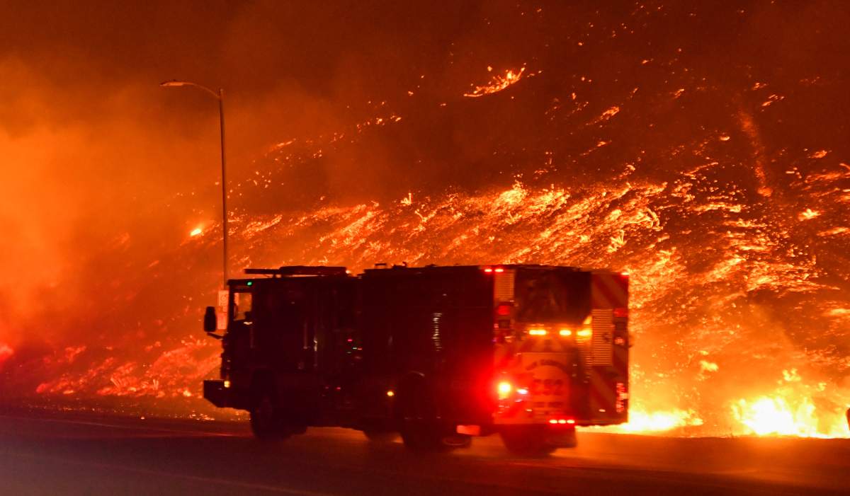Electricity back on for many as wildfires rage in California - image