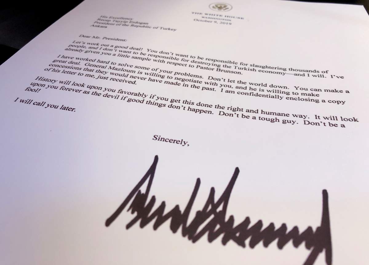 An October 9 letter from U.S. President Donald Trump to Turkey’s President Tayyip Erdogan warning Erdogan about Turkish military policy and the Kurdish people in Syria is seen after being released by the White House in Washington, U.S. October 16, 2019. (REUTERS/Jim Bourg)