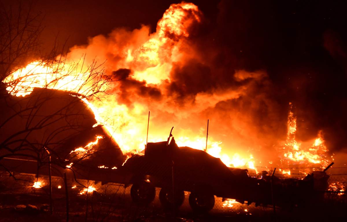 A trailer burns, as a wind-driven wildfire continues to burn in Canyon Country north of Los Angeles, California, U.S. October 25, 2019. REUTERS/Gene Blevins