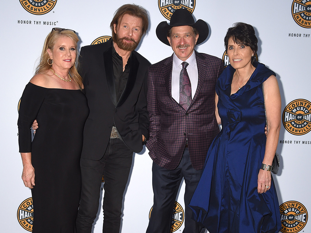 (L-R) Janine Dunn, Ronnie Dunn, Kix Brooks and Barbara Brooks at the 2019 Country Music Hall of Fame Medallion Ceremony held at the Country Music Hall of Fame & Museum on Oct. 20, 2019 in Nashville, Tenn.