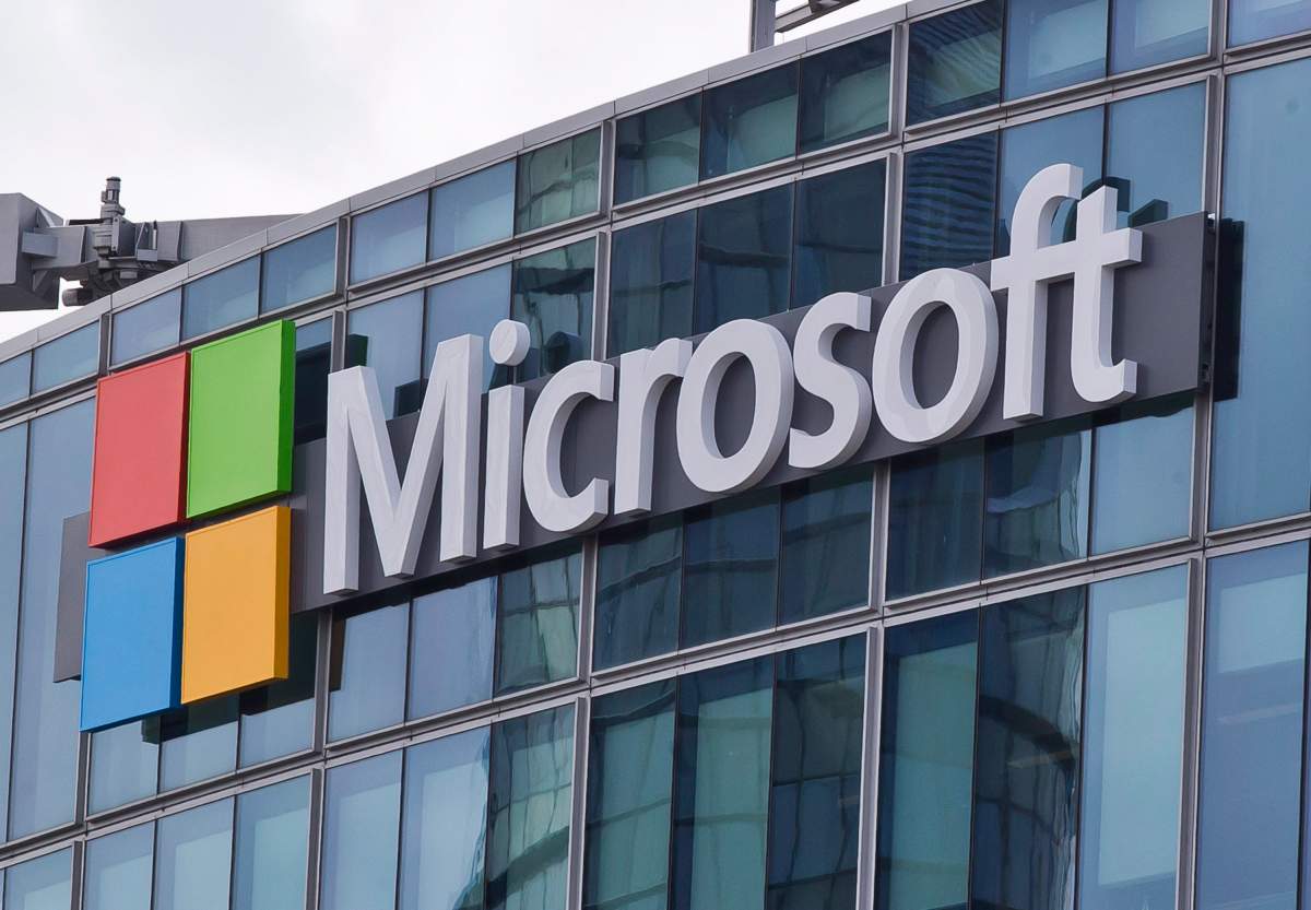 FILE - This April 12, 2016 file photo shows the Microsoft logo in Issy-les-Moulineaux, outside Paris, France.