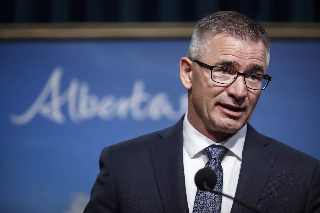 Travis Toews, Minister of Finance, speaks to the media in Calgary, Alta., Tuesday, Sept. 3, 2019. Alberta's nurses are seeking to have the proposed three per cent cut to their wages nullified.The demand is contained in a complaint of bad-faith bargaining filed by the the United Nurses of Alberta with the provincial Labour Relations Board.