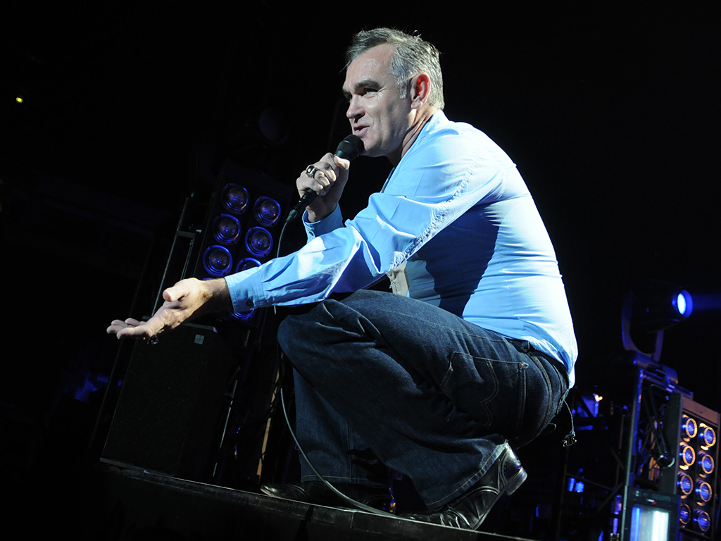 Morrissey performs on stage at Manchester Arena on July 28, 2012 in Manchester, United Kingdom.