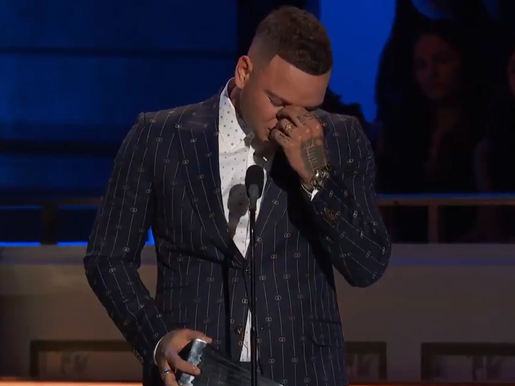 Kane Brown speaking on stage at CMT's 2019 Artists of the Year event  on Wednesday, Oct. 16, 2019.