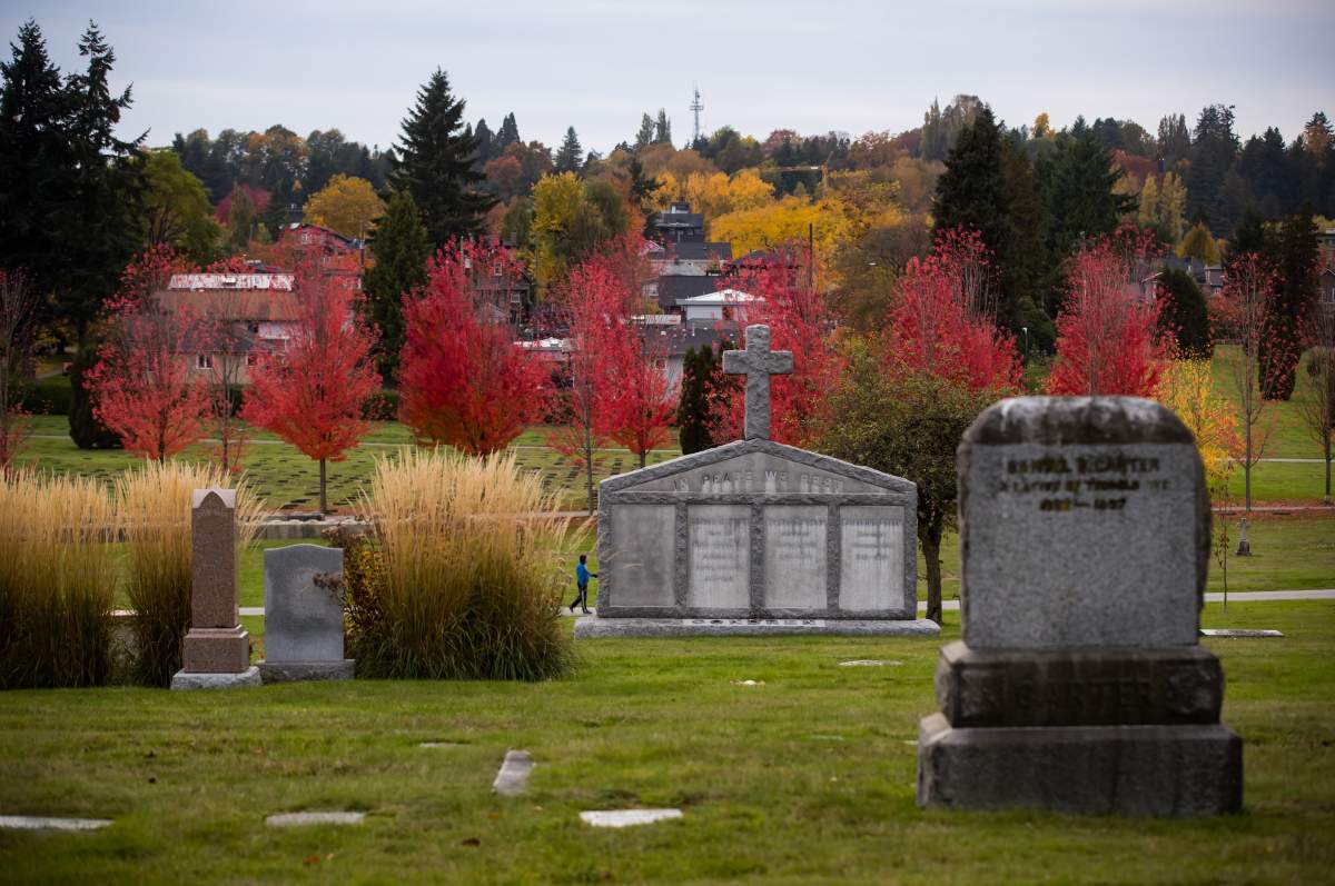 A man walks through Mountain View Cemetery in Vancouver, on Wednesday, Oct. 23, 2019. 