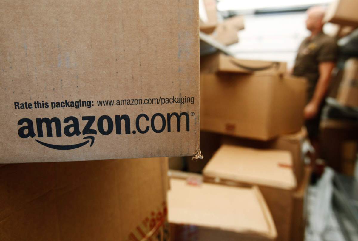  In this Oct. 18, 2010, file photo, an Amazon.com package awaits delivery.