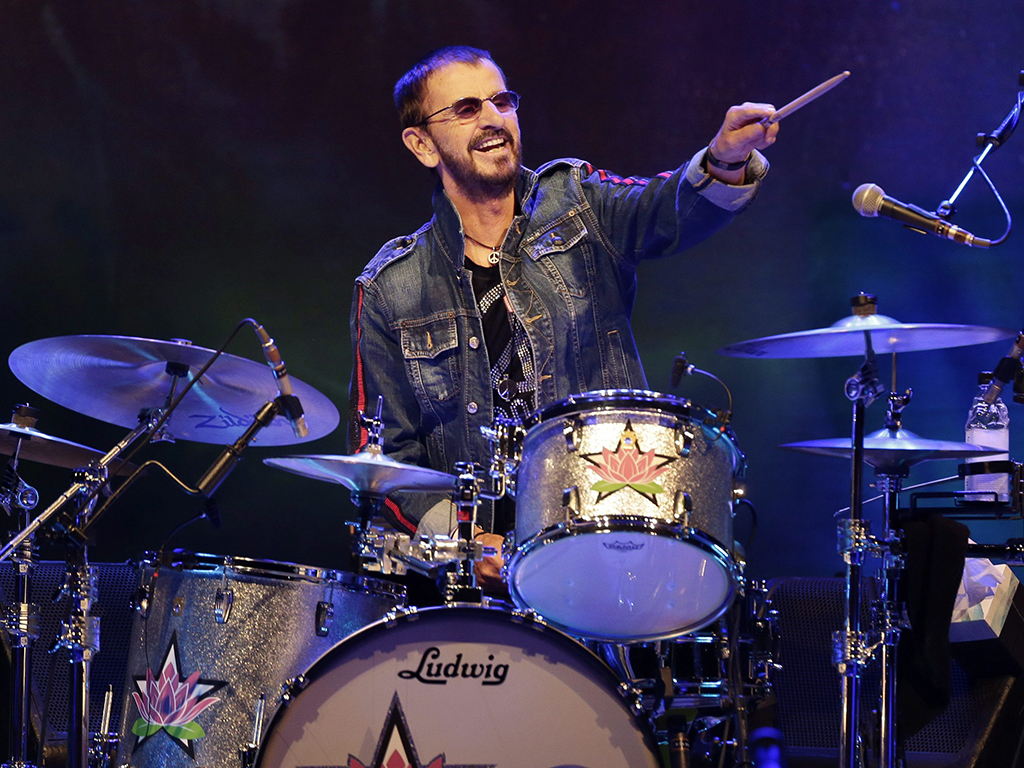 Ringo Starr plays as part of a concert celebrating the 50th anniversary of Woodstock in Bethel, N.Y., on Friday, Aug. 16, 2019.
