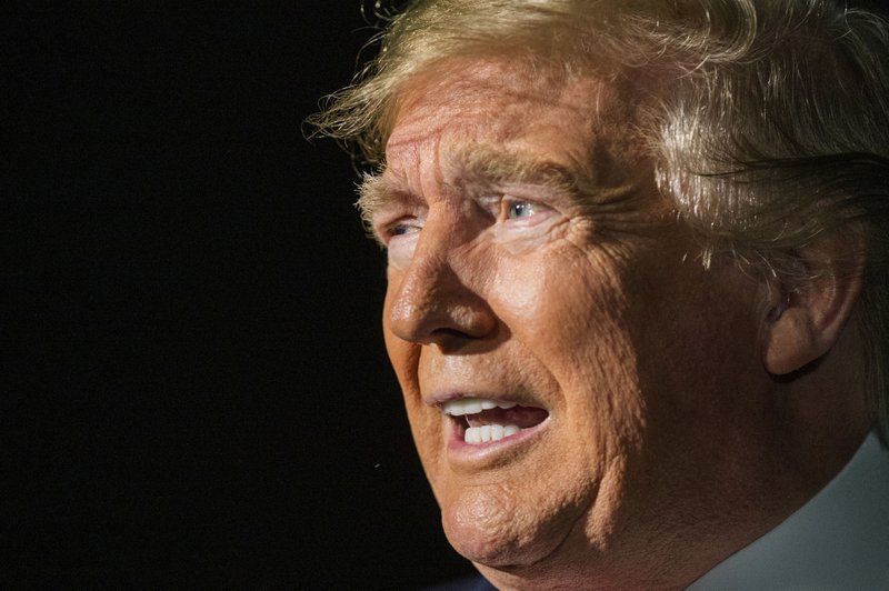 President Donald Trump speaks to reporters as he leaves the White House in Washington for a trip to New York City, Saturday, Nov. 2, 2019. 