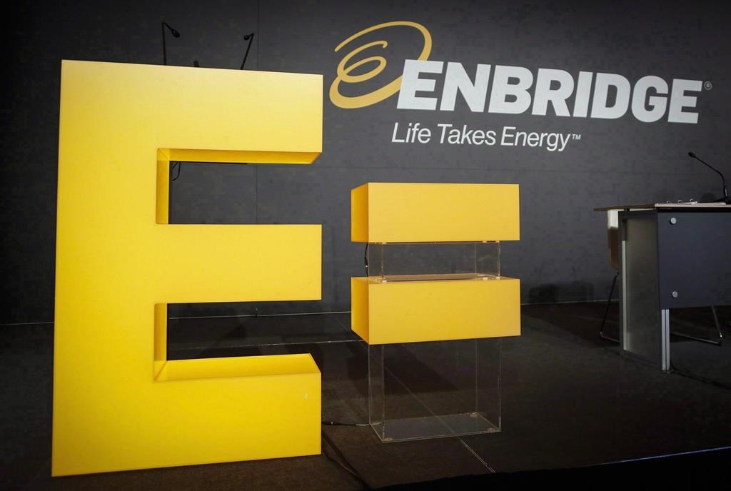 Enbridge company logos on display at the company's annual meeting in Calgary, Thursday, May 12, 2016.