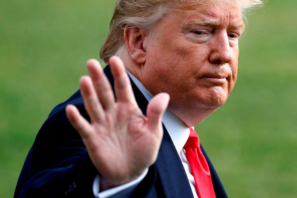 U.S. President Donald Trump walks to the Marine One helicopter after speaking to the media on Wednesday, Nov. 20, 2019.