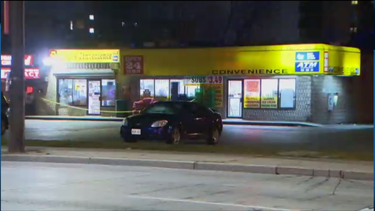 Hamilton police investigate a crime scene on Main Street East where Yosif Al-Hasnawi was shot on Dec. 2, 2017.