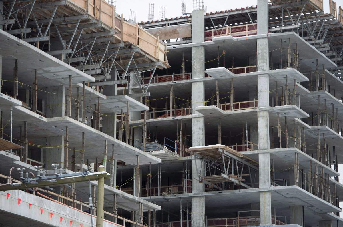 New condo buildings are shown under construction in downtown Vancouver, Wednesday, Feb. 8, 2017.