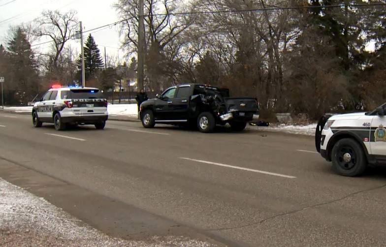 Police on scene where a truck was hit by the fire truck Friday.
