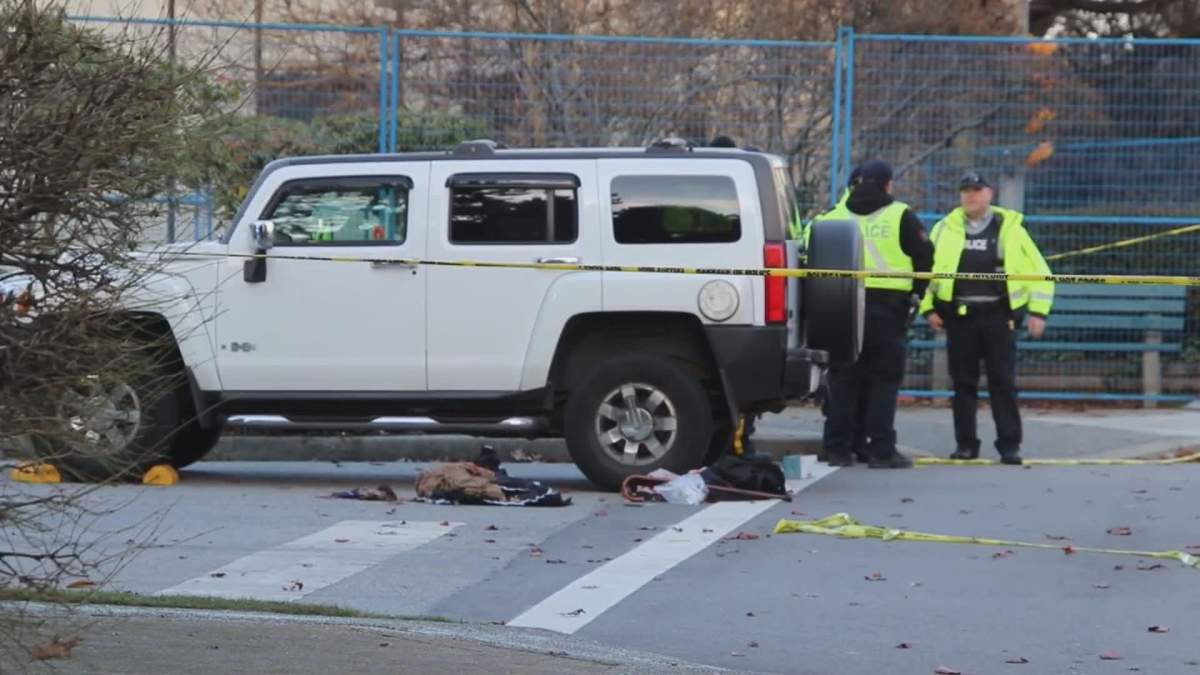 Police at the scene of a fatal collision in Burnaby on Wednesday. 
