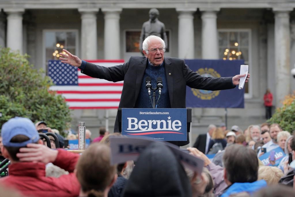 In this Oct. 31, 2019, file photo, Democratic presidential candidate Sen. Bernie Sanders, I-Vt., gestures during a rally after filing to be listed on the New Hampshire primary ballot at the Statehouse in Concord, N.H.  (AP Photo/Charles Krupa, File)