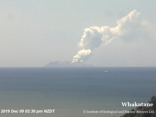 Smoke bellows from Whakaari, also known as White Island, volcano as it erupts in New Zealand, Dec. 9, 2019, in this image obtained via social media.