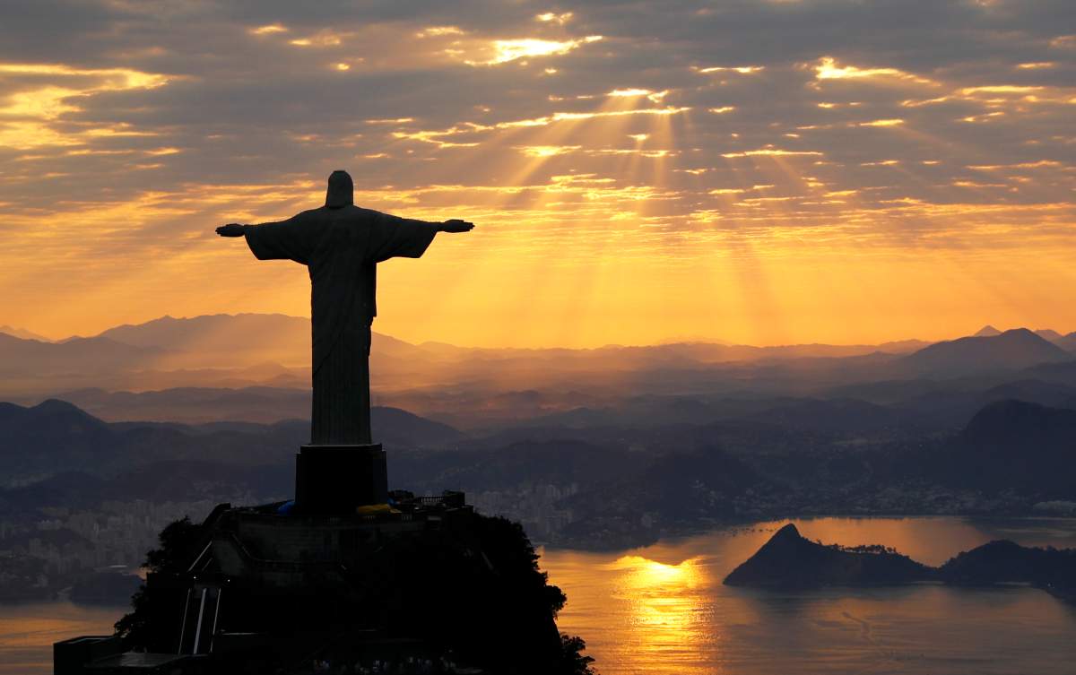 Jesus Christ The Redeemer is seen during sunrise in Rio de Janeiro, Brazil Aug. 2, 2016.