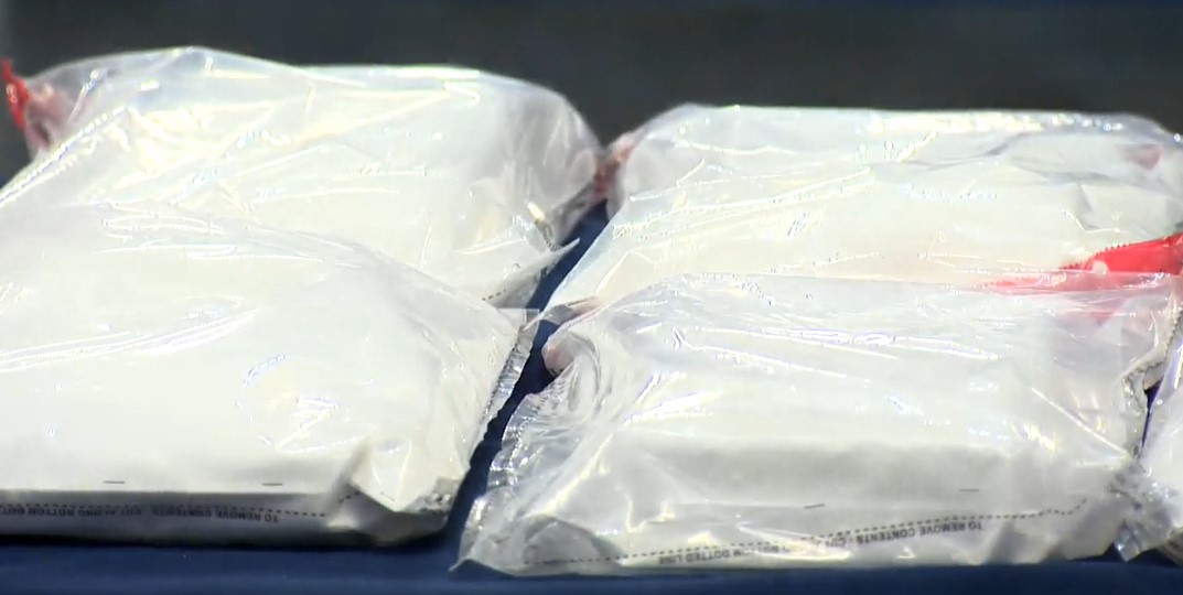 Police say they found 13 kilos of cocaine during the raids.