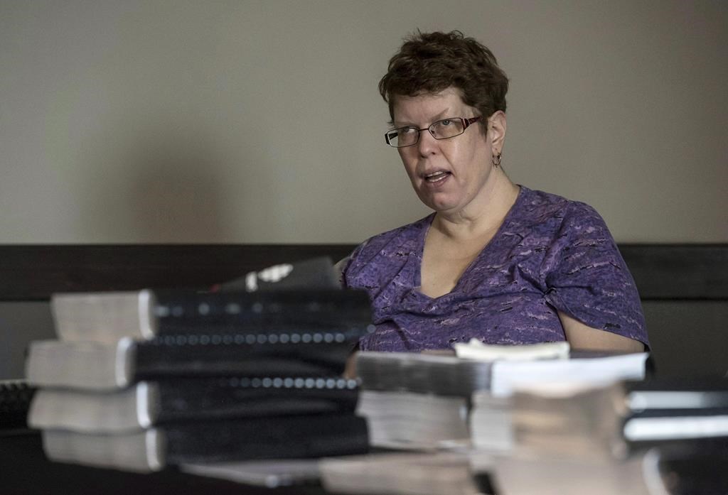 Beth MacLean is seen testifying at a human rights board of inquiry in 2018.